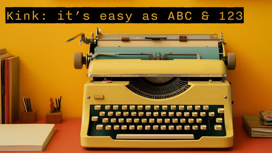 Yellow typewriter on a retro orange desk written Kink: it's easy as ABC & 123