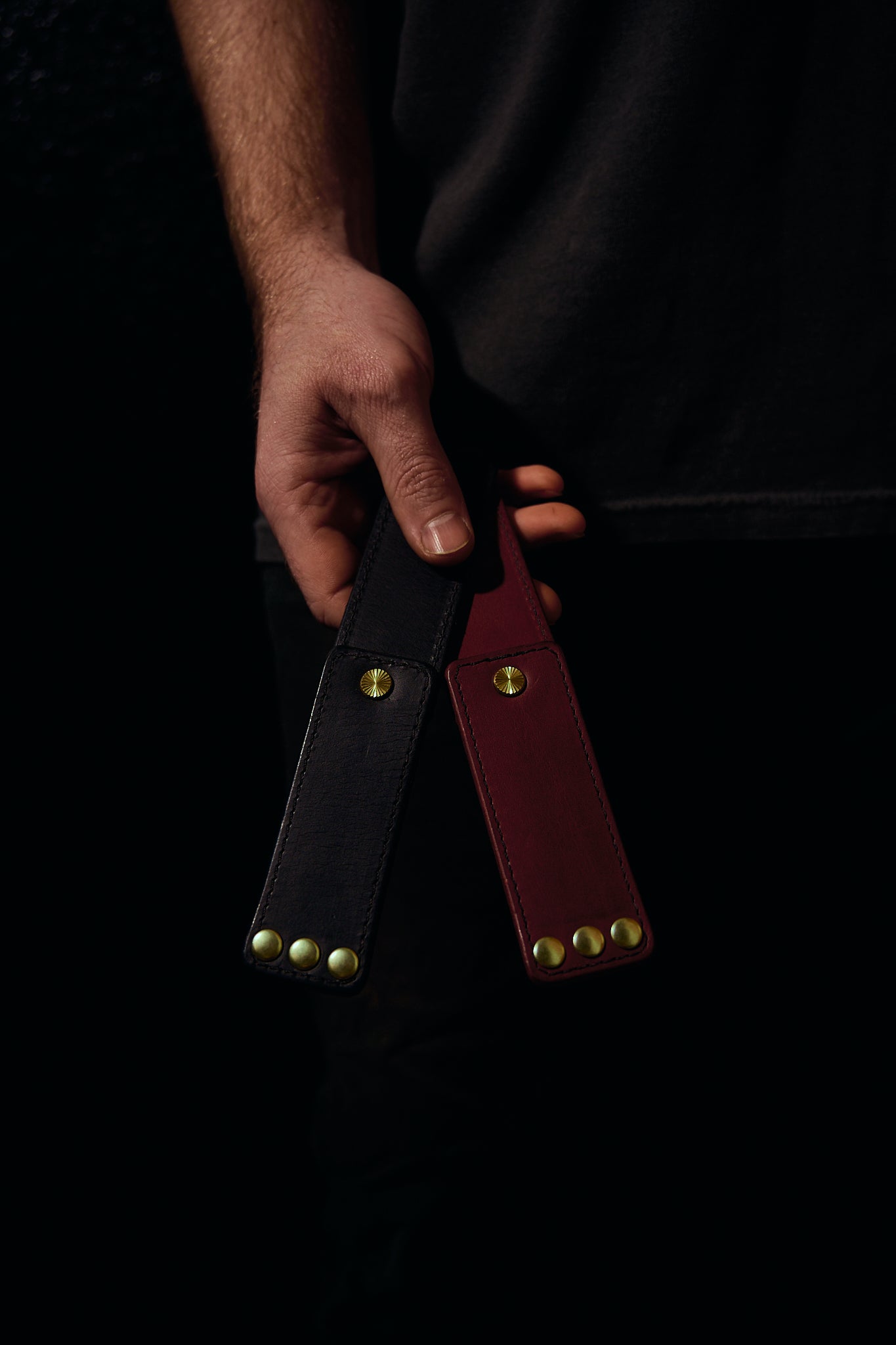 Lovey subby leather pocket paddles in black and pomegranite.
